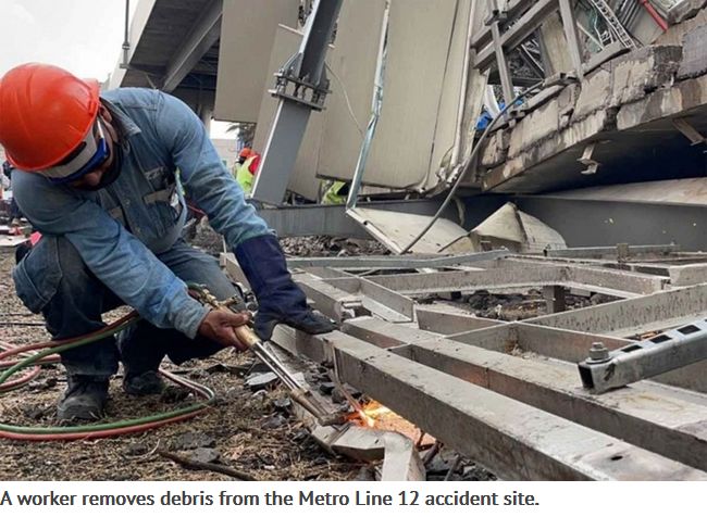Man removes Metro accident debris Line 12